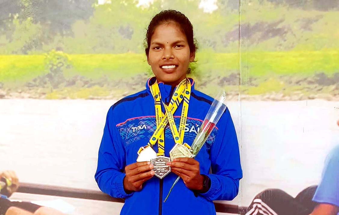 Odisha woman rower Jharana Hasti displays her medals at the Senior & Open Sprint National Championships in Pune on 26 February 2023.