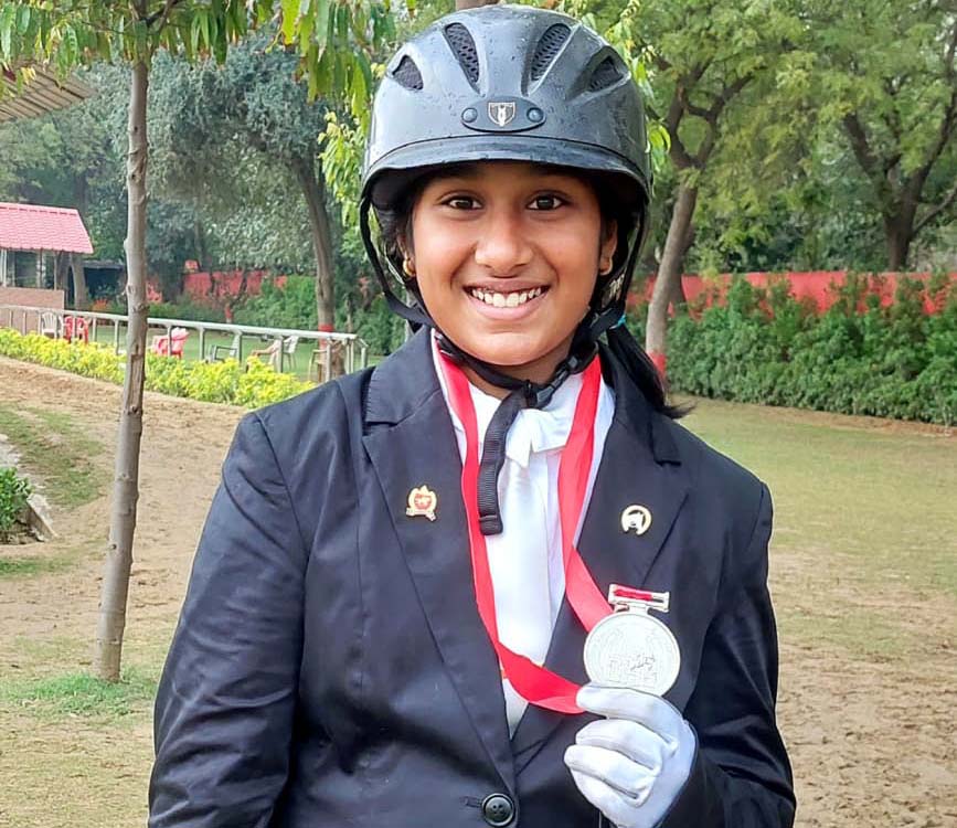 Odisha horse riding prodigy Rishita Samantaray poses with her silver medal in Ladies Open Hacks event of the Delhi Horse Show in New Delhi on 31 March 2023.