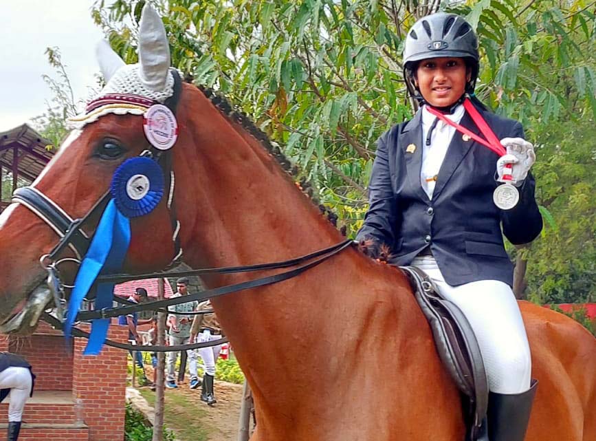 Odisha girl rider Rishita Samantaray with her horse Voltair in New Delhi on 31 March 2023.