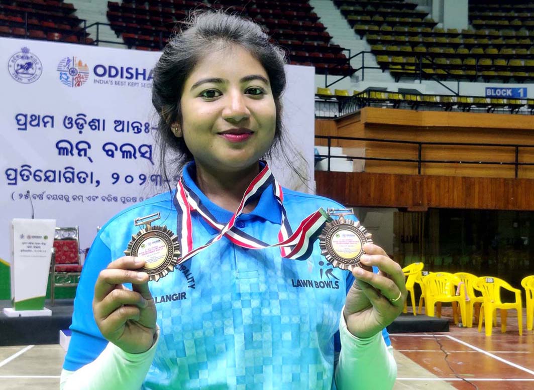 Odisha lawn bowling player Swetlana Bakshi poses with her medals at the 1st All-Odisha Inter-District Lawn Bowls Championship in Cuttack on 3 April 2023.