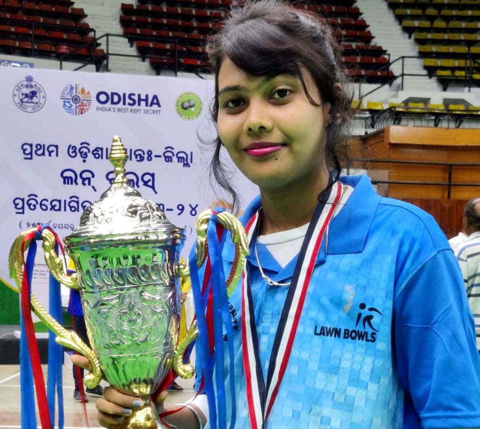 Odisha lawn bowling player Bishnupriya Bohidar poses with her trophy at the 1st All-Odisha Inter-District Lawn Bowls Championship in Cuttack on 3 April 2023.