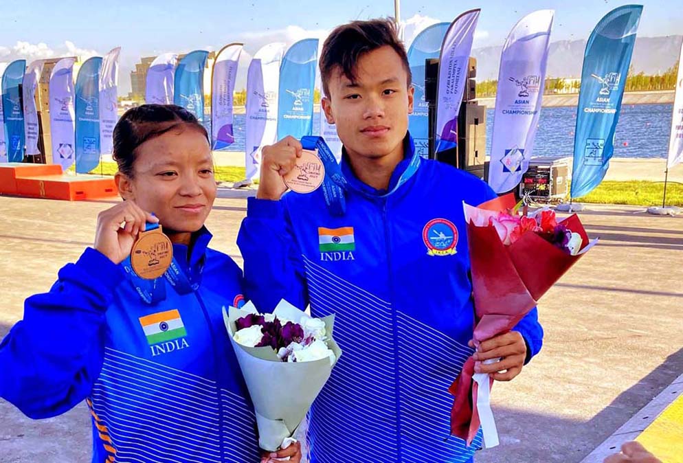 Tomthilnganba Ngashepam and Pukhrambam Roji Devi celebrate after winning bronze medal at the U23 Canoe Sprint Asian Championshipin Samarqand, Uzbekistan on 27 April 2023.
