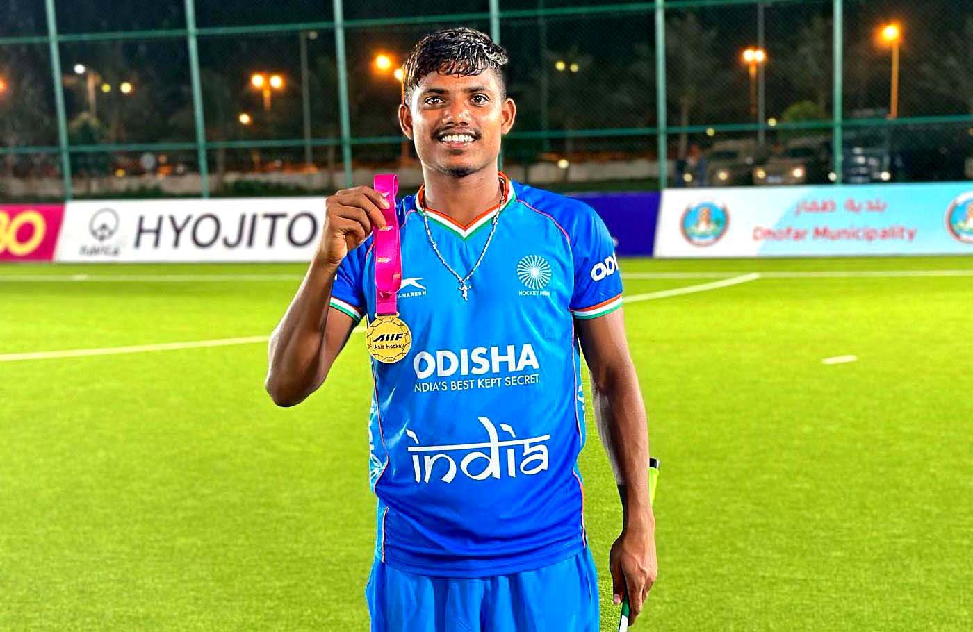 Odisha international Sudeep Chirmako poses with his Mens Hockey Junior Asia Cup gold medal in Salalah, Oman on 1 June 2023.