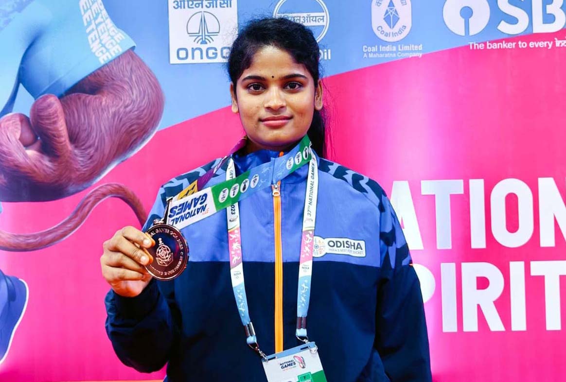 Odisha woman pencak silat player A Aswini Rao poses with her bronze medal at the 37th National Games in Panjim, Goa on 28 October 2023.