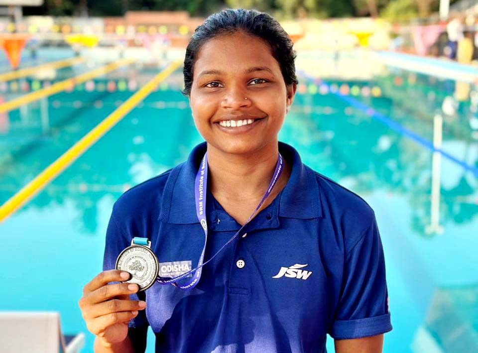 Odisha swimmer Sonia Patel poses with her bronze medal at the All India Inter University Aquatics Championship in Chennai on 3 February 2024.