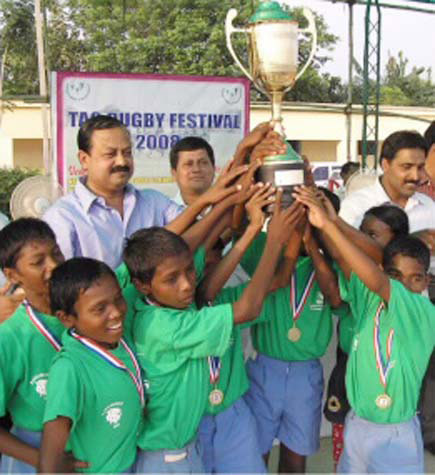 Kiss Lions celebrate with inter-school trophy in Bhubaneswar on Oct 31, 2008.