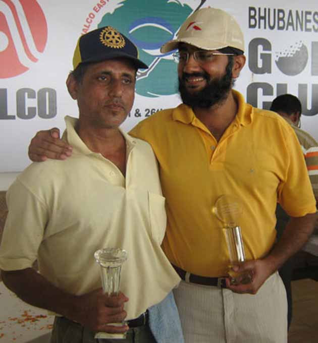 Srimoy Kar (L) and Dalbir Singh of BGC `A` take the team trophy at the Naloco East Zone Golf Tournament in Bhubaneswar on Jan 26, 2009.