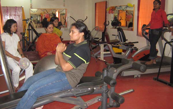 Powerlifting ace Ranu Mohanty tests a machine at the newly launched women’s gymnasium in Bhubaneswar on April 5, 2009.