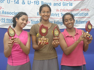 Ritika Nath (C), Nikkie Gargi (R) and Deveshi Debi with their trophies at the AITA Talent Series Tennis Tournament in Bhubaneswar on 22/05/2008.