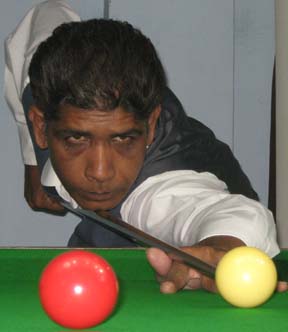 <b>Ahsan-ul Haque </b>aims for a putt at the CSA All-Orissa Open Snooker Tournament in Bhubaneswar on April 25, 2009.