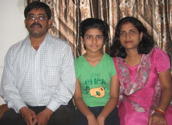 <b>Pooja Senapati </b>with her parents in Bhubaneswar on <b>May 21, 2009.