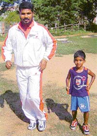File photo of eminent judo coach <b>Biranchi Das </b>with his desciple <b>Bhudhia Singh </b>in Bhubaneswar.