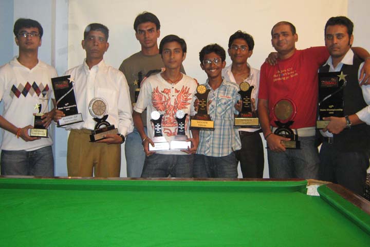 Champions and runners-up pose with trophies at the 15th State Billiards and Snooker Championship in Bhubaneswar on <b>August 9, 2009.