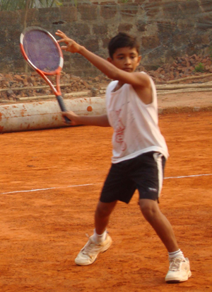 Promising tennis player Shakti Ray returns a ball during practice in Bhubaneswar. 28/05/2008