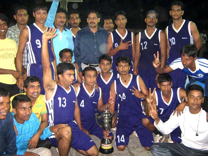Players of Government College of Physical Education With the inter-college basketball trophy in Bhubaneswar on <b>Oct 25, 2009.